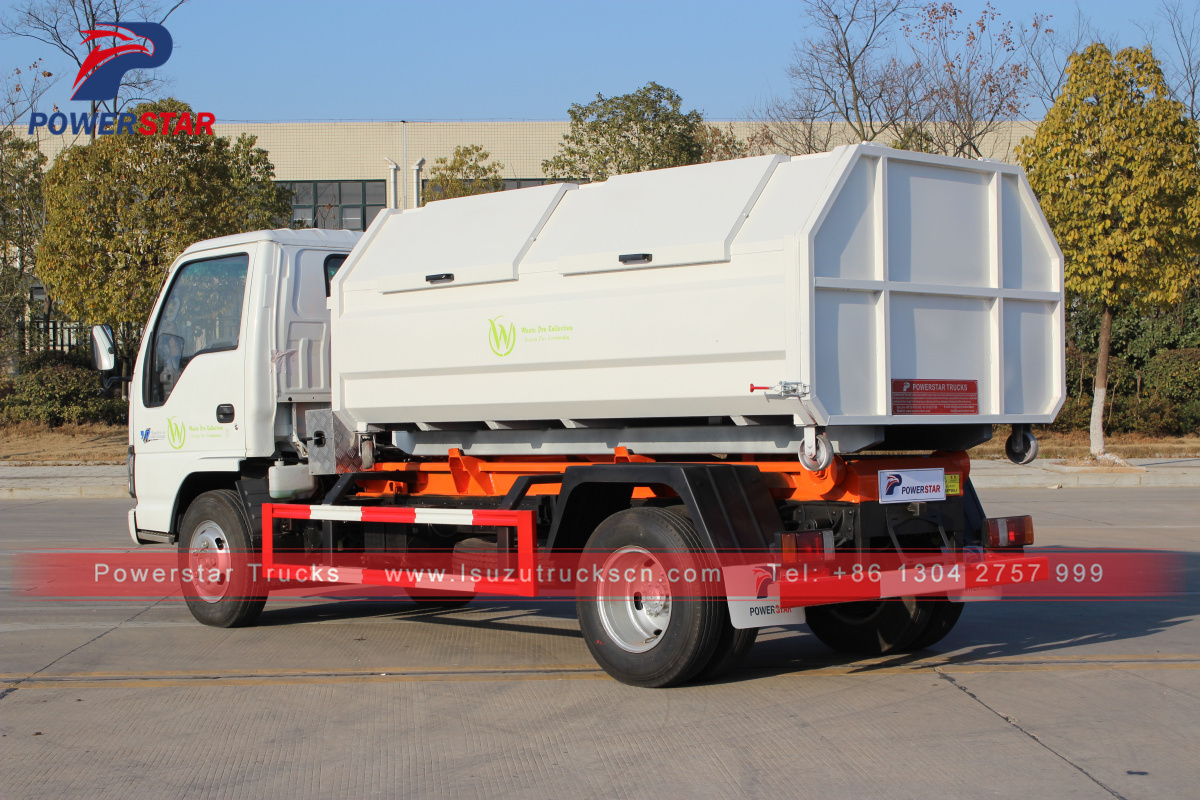 Saint Martin 1 Isuzu camion della spazzatura scarrabile con 4 bidoni della spazzatura