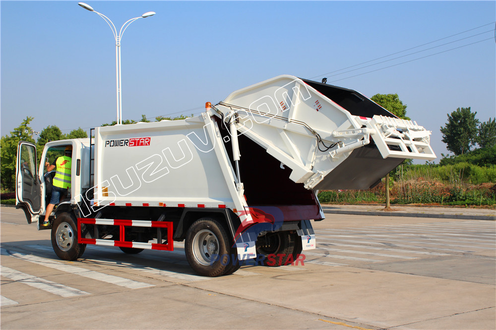 camion compattatore di rifiuti isuzu