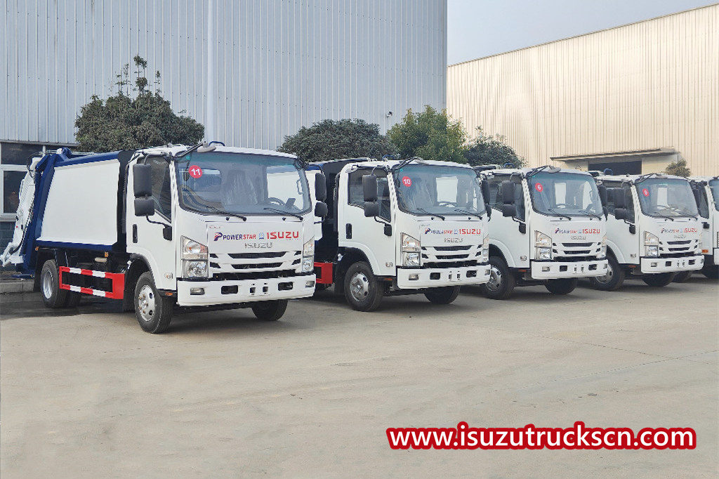 15 unità di camion compattatori di rifiuti Isuzu NKR per la spedizione
    